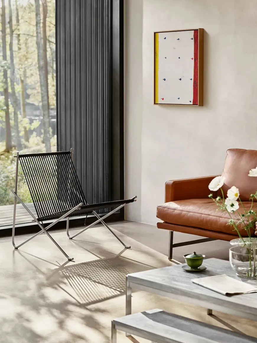 PK4 Loungestol i sort, stålstel af Poul Kjærholm