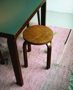 Stool E60, walnut stained fra Artek